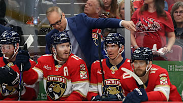 Florida Panthers head coach Paul Maurice talks with left wing Matthew Tkachuk (19)