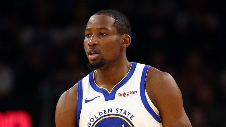 Dec 18, 2025; Phoenix, Arizona, USA; Golden State Warriors forward Jonathan Kuminga (1) against the Phoenix Suns at Mortgage Matchup Center. Mandatory Credit: Mark J. Rebilas-Imagn Images