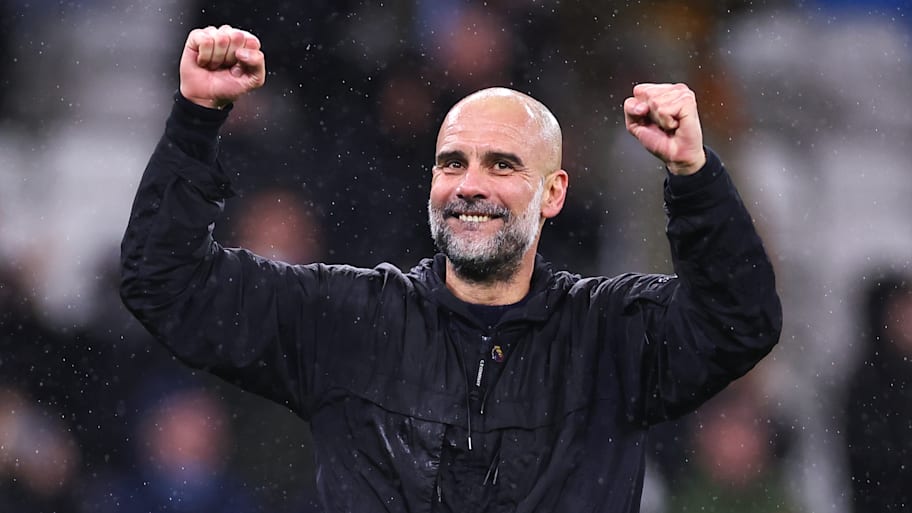 Pep Guardiola’celebrates with Manchester City’s fans after beating Newcastle