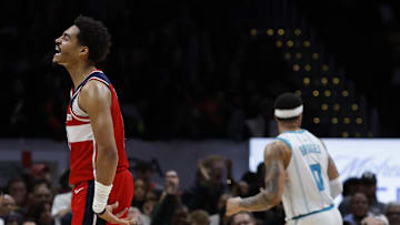 Mar 8, 2024; Washington, District of Columbia, USA; Washington Wizards guard Jordan Poole (13) celebrates on court against the Charlotte Hornets in the second half at Capital One Arena. Mandatory Credit: Geoff Burke-Imagn Images