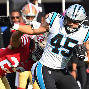 Oct 9, 2022; Charlotte, North Carolina, USA; Carolina Panthers fullback Giovanni Ricci (45) with the ball as San Francisco 49ers safety Talanoa Hufanga (29) defends in the second quarter at Bank of America Stadium.