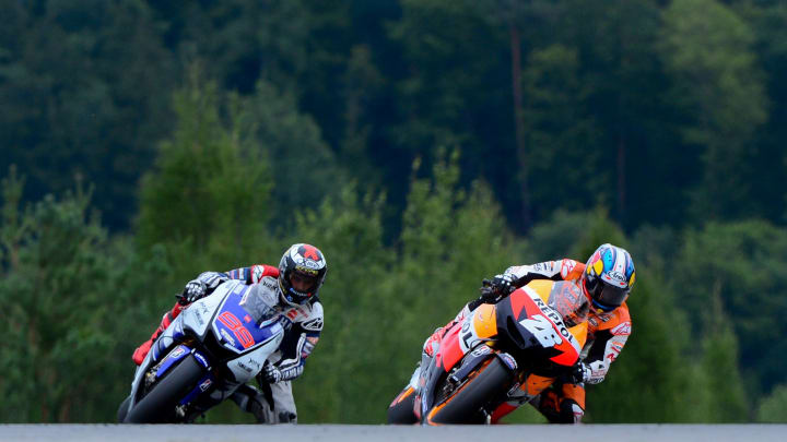 August 26, 2012; Brno, CZECH REPUBLIC; MotoGP rider Dani Pedrosa (ESP) leads Jorge Lorenzo (ESP) in turn 13 during the Czech Republic Grand Prix at Automotodrom Brno. Mandatory Credit: Matt Kartozian-USA TODAY Sports