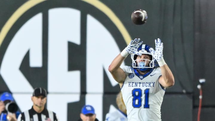 Nov 22, 2025; Nashville, Tennessee, USA;  Kentucky Wildcats tight end Willie Rodriguez (81) makes a catch on the sideline against the Vanderbilt Commodores during the second half at FirstBank Stadium. Mandatory Credit: Steve Roberts-Imagn Images