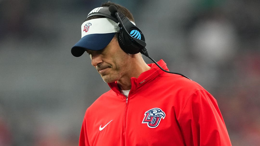 Jan 1, 2024; Glendale, AZ, USA; Liberty Flames head coach Jamey Chadwell reacts on the sidelines during the second half against the Oregon Ducks in the 2024 Fiesta Bowl at State Farm Stadium. Mandatory Credit: Joe Camporeale-Imagn Images