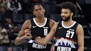 Nov 24, 2025; Memphis, Tennessee, USA; Denver Nuggets guard Peyton Watson (8) reacts with guard Jamal Murray (27) during the fourth quarter against the Memphis Grizzlies at FedExForum.