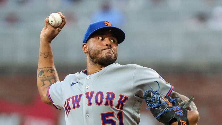 Jul 6, 2026; Cumberland, Georgia, USA; New York Mets pitcher Freddy Peralta (51) pitches the ball against the Atlanta Braves during the fourth inning at Truist Park. Mandatory Credit: Jordan Godfree-Imagn Images