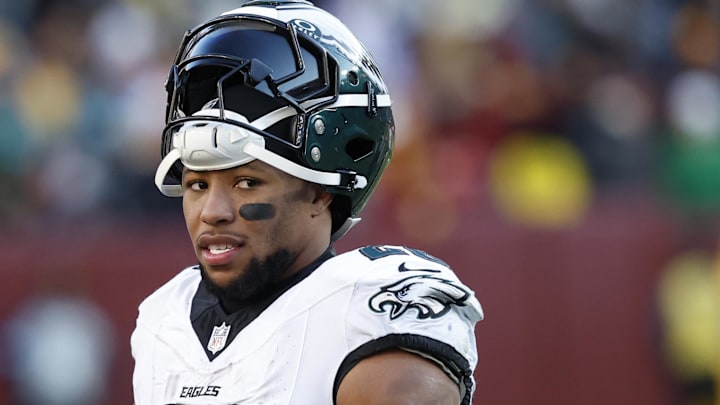 Dec 22, 2024; Landover, Maryland, USA; Philadelphia Eagles running back Saquon Barkley (26) stands on the field during a timeout against the Washington Commanders during the third quarter at Northwest Stadium. Mandatory Credit: Geoff Burke-Imagn Images