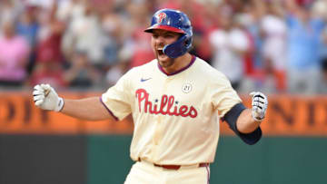 Sep 15, 2024; Philadelphia, Pennsylvania, USA; Philadelphia Phillies second base Buddy Kennedy (19) celebrates his Rbi double during the eighth inning against the New York Mets at Citizens Bank Park. Mandatory Credit: Eric Hartline-Imagn Images
