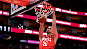 Oct 27, 2025; Houston, Texas, USA; Houston Rockets center Alperen Sengun (28) dunks against the Brooklyn Nets during the first quarter at Toyota Center. Mandatory Credit: Erik Williams-Imagn Images
