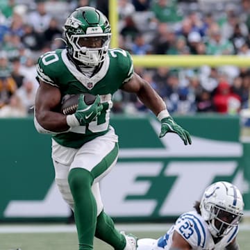 Nov 17, 2024; East Rutherford, New Jersey, USA; New York Jets running back Breece Hall (20) runs with the ball against the Indianapolis Colts.