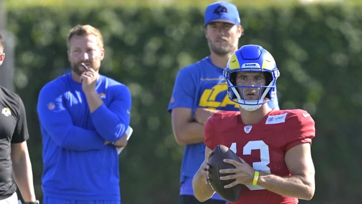 Los Angeles Rams quarterback Matthew Stafford (9) and head coach Sean McVay with quarterback Stetson Bennett (13). Mandatory Credit: Jayne Kamin-Oncea-Imagn Images