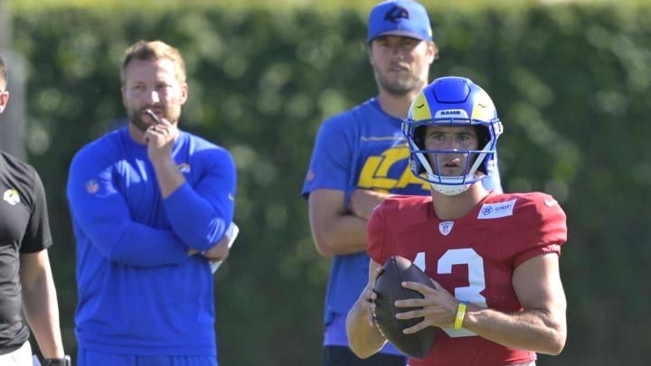 Jul 29, 2024; Los Angeles, CA, USA; Los Angeles Rams quarterback Matthew Stafford (9) and head coach Sean McVay look on as quarterback Stetson Bennett (13) participates in drills during training camp at Loyola Marymount University. Mandatory Credit: Jayne Kamin-Oncea-USA TODAY Sports