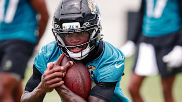 May 10, 2025; Jacksonville, FL, USA; Jacksonville Jaguars wide receiver Travis Hunter (12) participates in a drill during rookie minicamp practice at Miller Electric Center. Mandatory Credit: Travis Register-Imagn Images