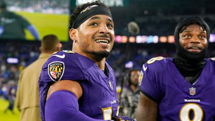 Dec 10, 2023; Baltimore, Maryland, USA;  Baltimore Ravens wide receiver Tylan Wallace (16) and quarterback Lamar Jackson (8) celebrate after winning in overtime against the Los Angeles Rams at M&T Bank Stadium. Mandatory Credit: Jessica Rapfogel-USA TODAY Sports