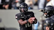Nov 2, 2024; West Point, New York, USA; Army Black Knights quarterback Dewayne Coleman (10) arms up before the first half against the Air Force Falcons at Michie Stadium. Mandatory Credit: Danny Wild-Imagn Images