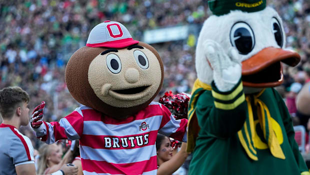 Oct 12, 2024; Eugene, Oregon, USA; Ohio State Buckeyes mascot Brutus and the Oregon Duck interact