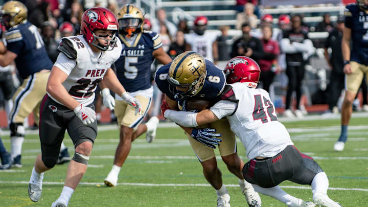 La Salle's Joey O'Brien picks up yardage against St. Joseph's Prep in the Philadelphia Catholic League 6A championship football game Saturday, Nov. 1, 2025, at Villanova Stadium in Radnor.