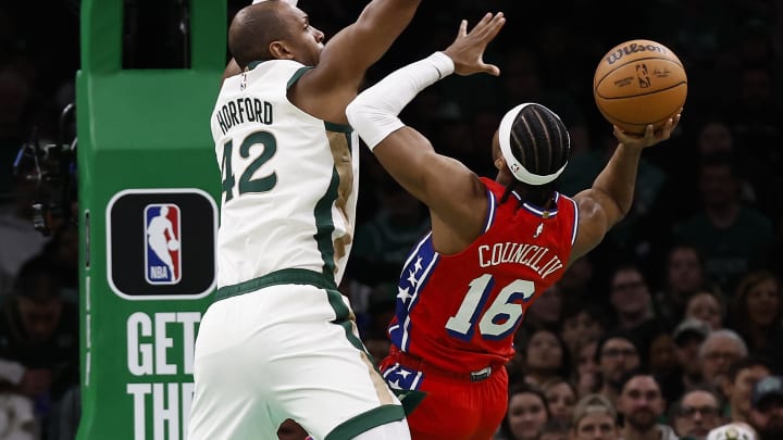 Feb 27, 2024; Boston, Massachusetts, USA; Boston Celtics center Al Horford (42) tries to block a shot by Philadelphia 76ers guard Ricky Council IV (16) during the second half at TD Garden. Mandatory Credit: Winslow Townson-USA TODAY Sports