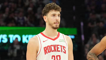 Mar 10, 2024; Sacramento, California, USA; Houston Rockets center Alperen Sengun (28) and forward Jabari Smith Jr. (10) stand on the court during the third quarter against the Sacramento Kings at Golden 1 Center. Mandatory Credit: Darren Yamashita-Imagn Images