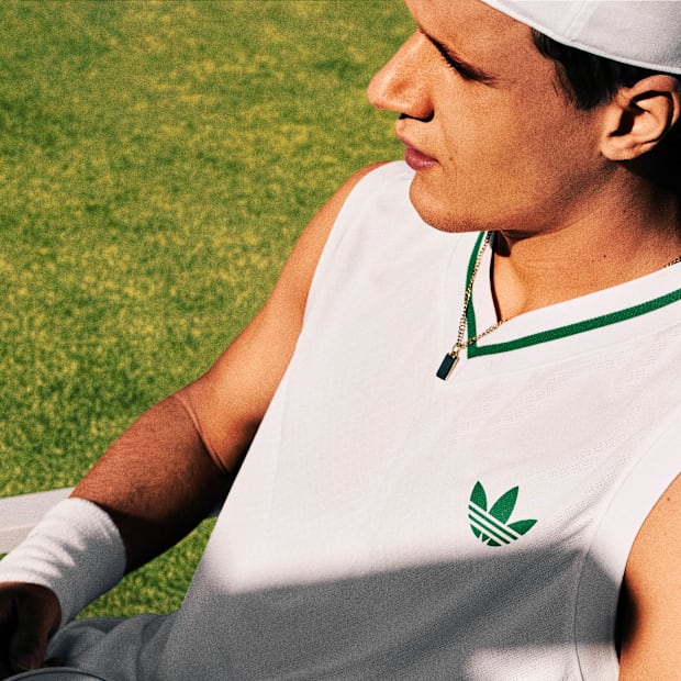 Jakub Menšík models adidas tennis apparel.