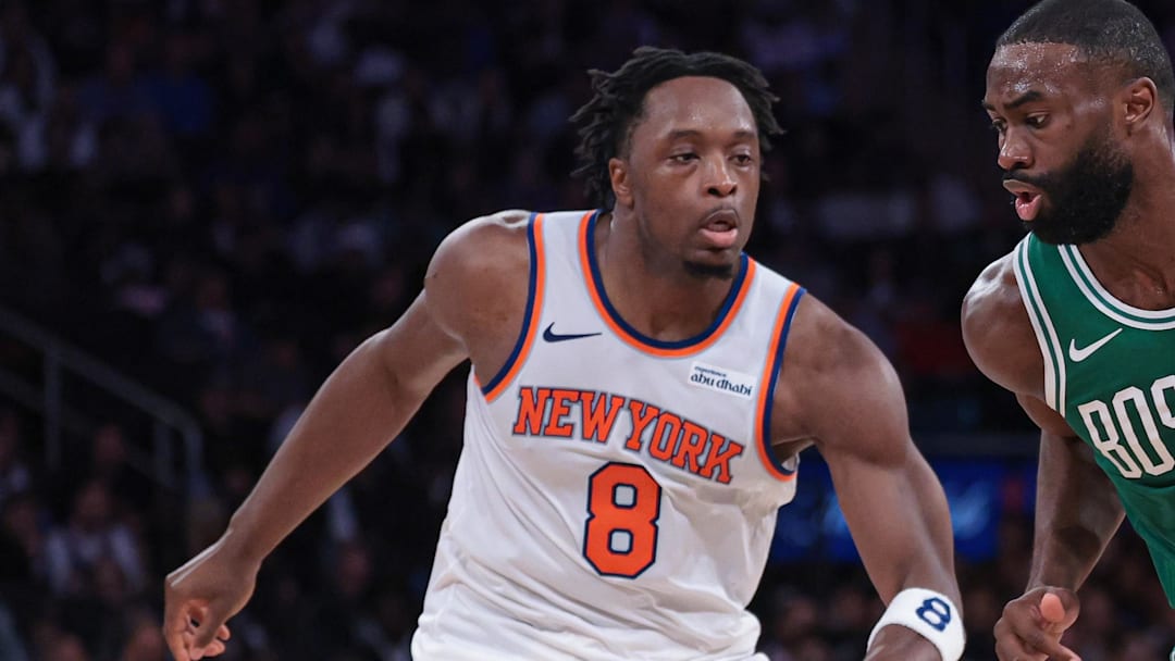 Oct 24, 2025; New York, New York, USA;  Boston Celtics guard Jaylen Brown (7) dribbles against New York Knicks forward OG Anunoby (8) during the fourth quarter at Madison Square Garden. Mandatory Credit: Vincent Carchietta-Imagn Images