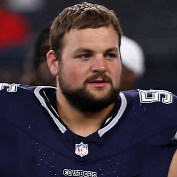 Aug 24, 2024; Arlington, Texas, USA; Dallas Cowboys guard Cooper Beebe (56) walks off the field after the game against the Los Angeles Chargers at AT&T Stadium. 