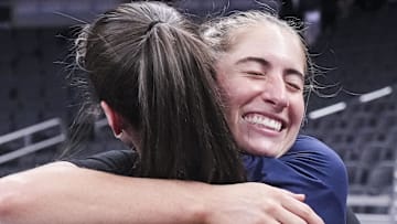 Las Vegas Aces guard Kate Martin and Indiana Fever guard Caitlin Clark, both former Iowa Hawkeyes, reunite during a game between the Indiana Fever and the Las Vegas Aces.