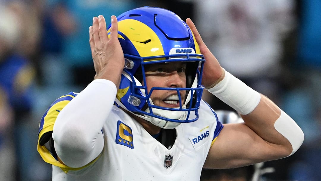 Jan 10, 2026; Charlotte, NC, USA; Los Angeles Rams quarterback Matthew Stafford (9) changes signals at the line in the first quarter in an NFC Wild Card Round game at Bank of America Stadium. Mandatory Credit: Bob Donnan-Imagn Images