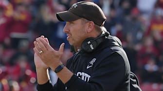 Iowa State head coach Matt Campbell celebrates after an interception by defenders against Kansas during the fourth quarter in the senior day on Nov. 22, 2025, at Jack Trice Stadium in Ames, Iowa