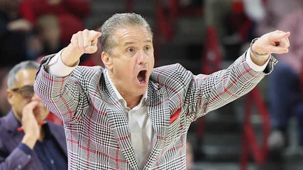 Arkansas Razorbacks coach John Calipari points the way for his Razorbacks during Saturday's scintillating 93-92 victory over 
