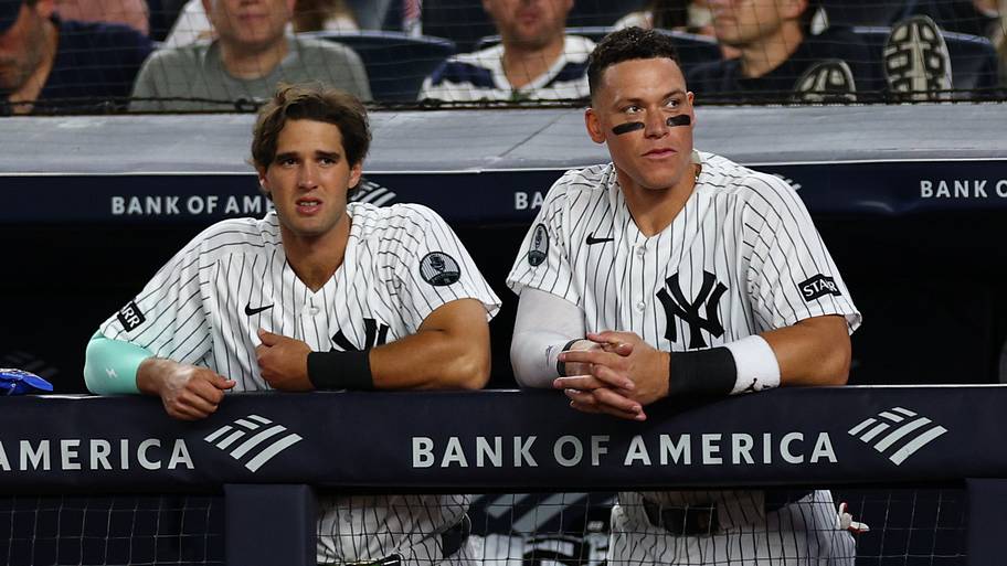 New York Yankees right fielder Spencer Jones (78) and right fielder Aaron Judge (99) look on from the dugout 