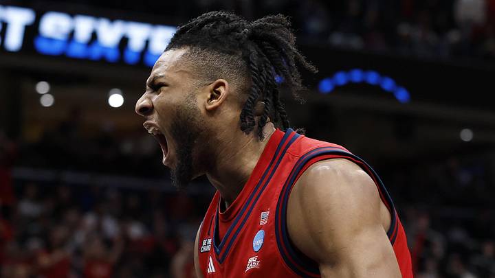 Mar 27, 2026; Washington, DC, USA; St. John's Red Storm forward Zuby Ejiofor (24) reacts after a dunk against the Duke Blue Devils in the second half during a Sweet Sixteen game of the East Regional of the men's 2026 NCAA Tournament at Capital One Arena. Mandatory Credit: Amber Searls-Imagn Images