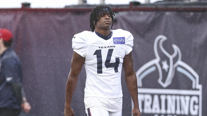 Jul 27, 2024; Houston, TX, USA; Houston Texans cornerback Kamari Lassiter (14) during training camp at Houston Methodist Training Center. Mandatory Credit: Troy Taormina-USA TODAY Sports