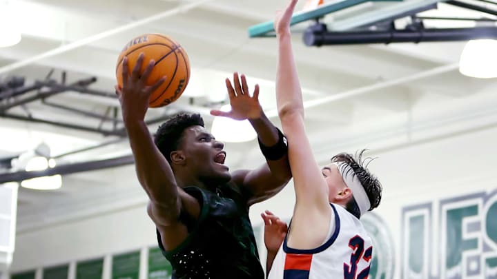 Tounde Yessoufou of St. Joseph drives to the basket against Modesto Christian in the 27th MLK Classic at De La Salle High School.