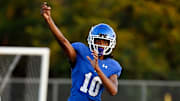 Antioch quarterback Andre Adams (10) passes the ball against James Lawson during an high school football scrimmage Thursday, Aug. 15, 2024, in Antioch, Tenn.