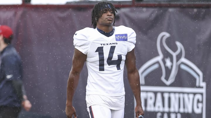 Jul 27, 2024; Houston, TX, USA; Houston Texans cornerback Kamari Lassiter (14) during training camp at Houston Methodist Training Center. Mandatory Credit: Troy Taormina-USA TODAY Sports