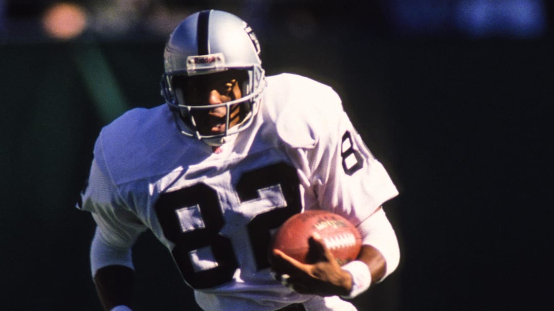 Sep 21, 1997; East Rutherford, NJ, USA; FILE PHOTO;  Oakland Raiders receiver James Jett (82) in action against the New York Jets at Giants Stadium. Mandatory Credit: Lou Capozzola-USA TODAY NETWORK