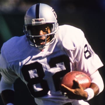 Sep 21, 1997; East Rutherford, NJ, USA; FILE PHOTO;  Oakland Raiders receiver James Jett (82) in action against the New York Jets at Giants Stadium. Mandatory Credit: Lou Capozzola-USA TODAY NETWORK