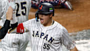 Mar 21, 2023; Miami, Florida, USA; Japan third baseman Munetaka Murakami (55) celebrates home run against the USA in the second inning at LoanDepot Park. Mandatory Credit: Rhona Wise-Imagn Images