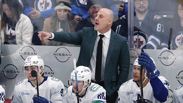 Mar 30, 2025; Winnipeg, Manitoba, CAN; Vancouver Canucks head coach Rick Tocchet gestures during a game against the Winnipeg Jets in the third period at Canada Life Centre. Mandatory Credit: James Carey Lauder-Imagn Images