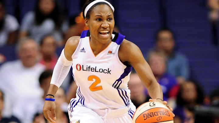 Sep 25, 2011; Phoenix, AZ, USA; Phoenix Mercury guard Temeka Johnson (2) handles the ball against the Minnesota Lynx during the second half at the US Airways Center.  The Lynx defeated the Mercury 103-86. Mandatory Credit: Jennifer Stewart-Imagn Images