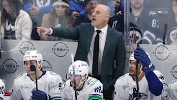 Mar 30, 2025; Winnipeg, Manitoba, CAN; Vancouver Canucks head coach Rick Tocchet gestures during a game against the Winnipeg Jets in the third period at Canada Life Centre. Mandatory Credit: James Carey Lauder-Imagn Images