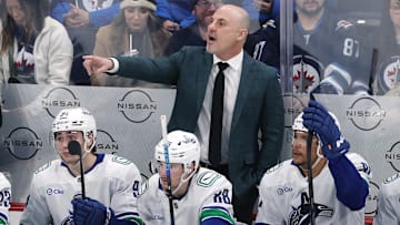 Mar 30, 2025; Winnipeg, Manitoba, CAN; Vancouver Canucks head coach Rick Tocchet gestures during a game against the Winnipeg Jets in the third period at Canada Life Centre. Mandatory Credit: James Carey Lauder-Imagn Images