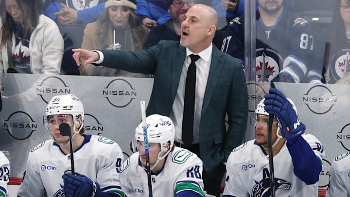 Mar 30, 2025; Winnipeg, Manitoba, CAN; Vancouver Canucks head coach Rick Tocchet gestures during a game against the Winnipeg Jets in the third period at Canada Life Centre. Mandatory Credit: James Carey Lauder-Imagn Images
