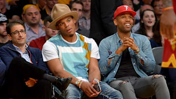 Mar 10, 2016; Los Angeles, CA, USA;  Carolina Panthers quarterback Cam Newton and Maverick Carter the business manager and childhood friend of Cleveland Cavaliers forward LeBron James (not pictured) attend the game against the Los Angeles Lakers at Staples Center. 