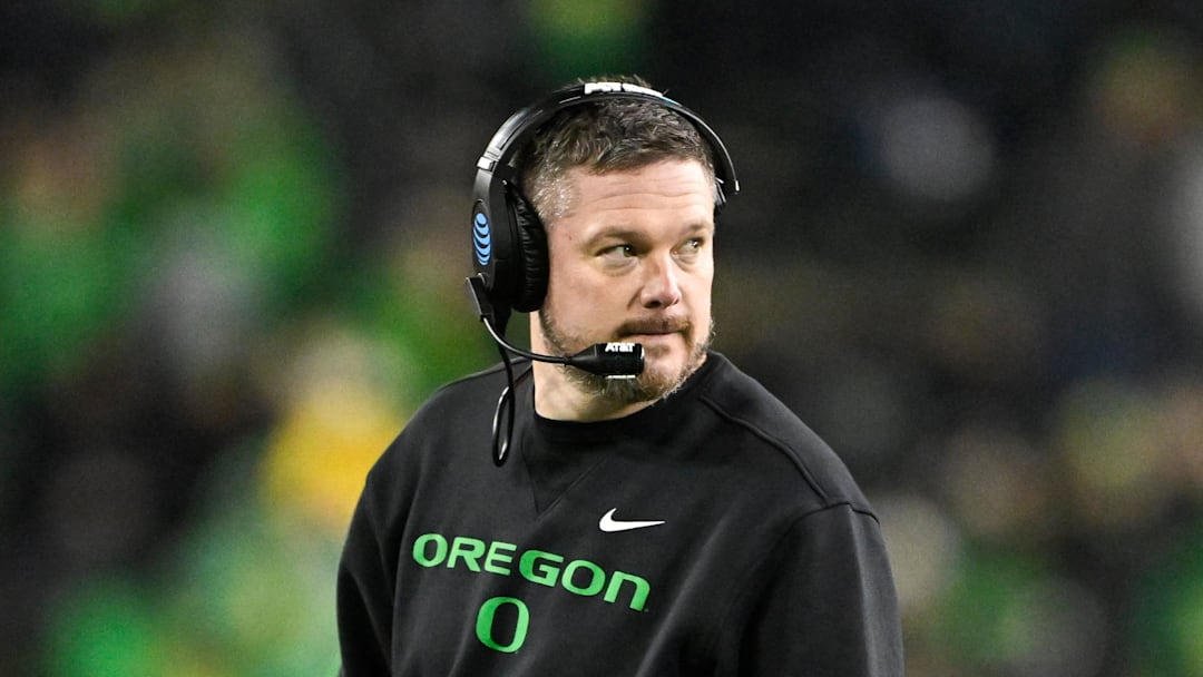 Dec 20, 2025; Eugene, OR, USA;  Oregon Ducks head coach Dan Lanning looks on during the fourth quarter against the James Madison Dukes at Autzen Stadium. Mandatory Credit: Craig Strobeck-Imagn Images