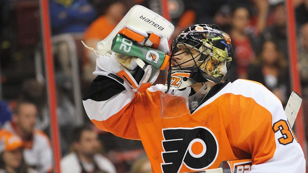Apr 18, 2013; Philadelphia, PA, USA; Philadelphia Flyers goalie Ilya Bryzgalov (30) takes a break against the New Jersey Devils during the third period at the Wells Fargo Center. The Devils defeated the Flyers, 3-0.