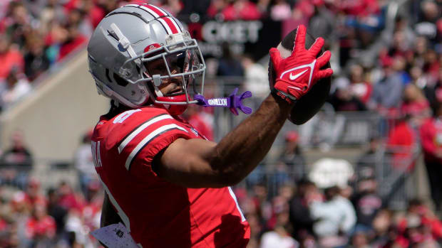 April 13, 2024; Columbus, Ohio, USA; 
Ohio State Buckeyes wide receiver Emeka Egbuka (2) catches a pass for the scarlet team during the first half of the LifeSports Spring Game at Ohio Stadium on Saturday.