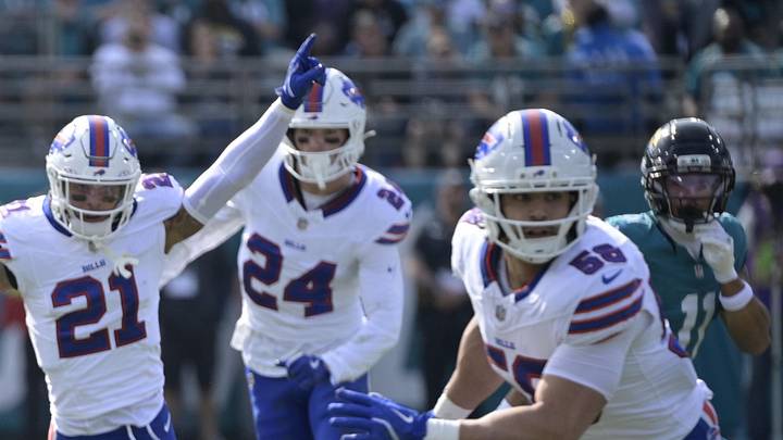 Jan 11, 2026; Jacksonville, FL, USA; Buffalo Bills linebacker Shaq Thompson (45) runs with the ball after an interception against the Jacksonville Jaguars during the first half in an AFC Wild Card Round game at EverBank Stadium. Mandatory Credit: Melina Myers-Imagn Images