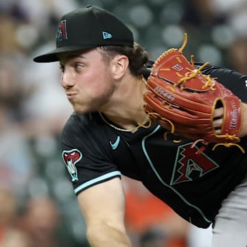 Sep 6, 2024; Houston, Texas, USA; Arizona Diamondbacks starting pitcher Brandon Pfaadt (32) pitches against the Houston Astros in the first inning at Minute Maid Park. Mandatory Credit: Thomas Shea-Imagn Images